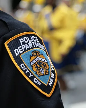 Public Safety Services image of NYC police badge